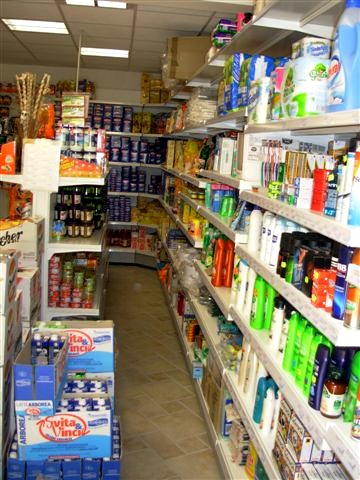 Arredamenti negozi alimentari scaffalature self service for Scaffali per negozi alimentari prezzi