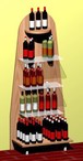 espositore murale sagomato per bottiglie vino con piani vetro