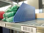 divisorio in plastica con banda magnetica per scaffali metallici