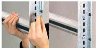 montaggio barre porta gomme per scaffali gommisti